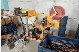 ضبط مصنع بدون ترخيص وإستخدام علامات تجارية وهمية غير مسجلة